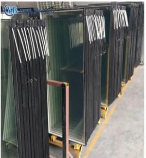 Authorized supplier catalogue photograph of ITO heating glass panels stored upright