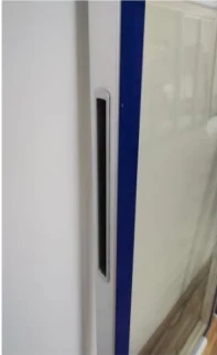 Authorized supplier photograph showing the edge and rear profile of a logo glass door